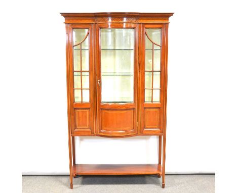 Edwardian inlaid mahogany china cabinet, bowfront with moulded cornice above glazed door and panels, aquare tapering legs joi