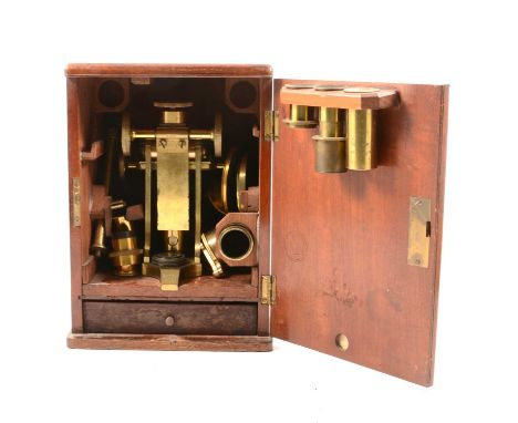 Victorian brass monocular microscope, by M Pillischer, London, No. 720, with lenses and accessories, in a fitted walnut case,
