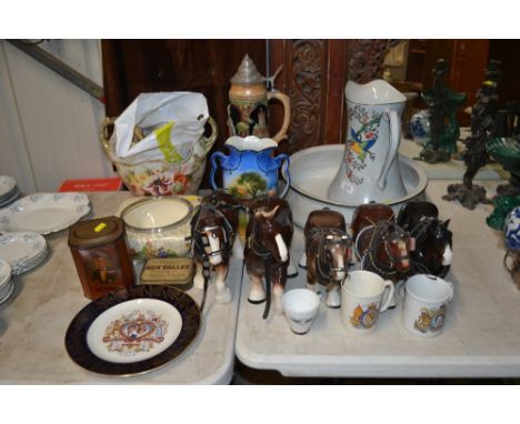 A Solian ware toilet jug and basin with floral decoration, a collection of pottery horses, beer stein, floral decorated jardi