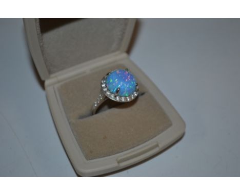 A large sterling silver and opal CZ dress ring, size OP