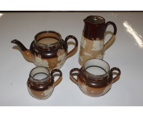 Four pieces of Royal Doulton Harvestware including teapot with silver rim lacking lid; matching sugar bowl and cream jug and 