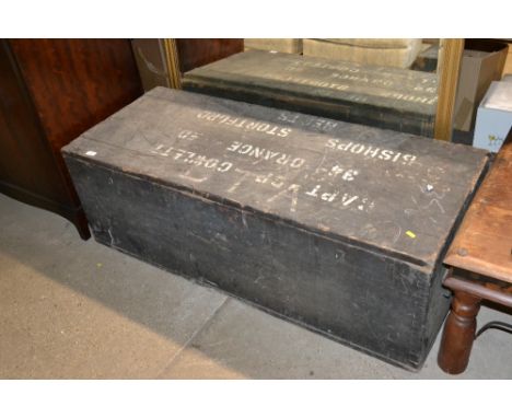A painted military storage trunk