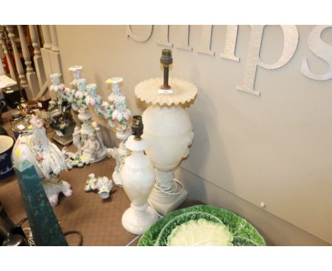 An alabaster table lamp base and an onyx table lamp base