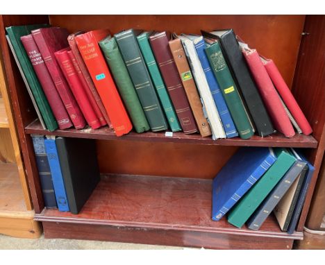 A collection of stamp albums and stock books containing world stamps from Indonesia, Great Britain, Germany, Jamaica, etc, wi