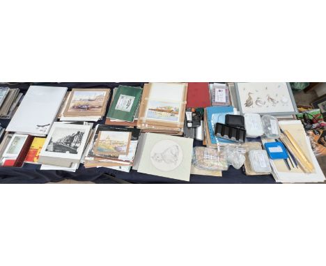 A collection of Watercolours together with artists sketch books, paints etc 