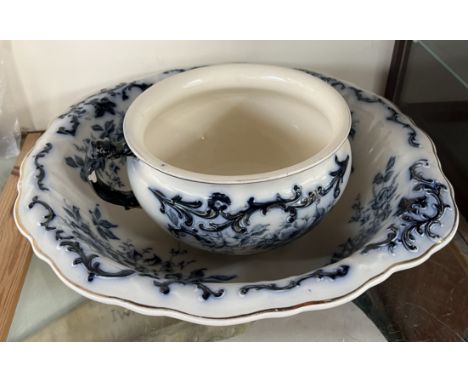A blue and white chamber pot together with a matching basin