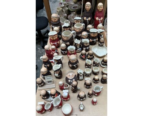 A collection of Goebel pottery jugs, cruets, dishes, decanters etc modelled as monks 