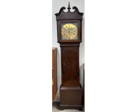 A 19th century oak cased longcase clock, the hood with a broken swan neck pediment above a long trunk door, box base and brac