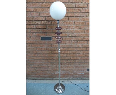 A vintage chrome based standard lamp