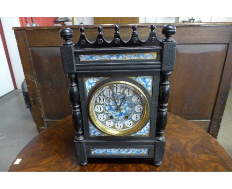 An Aesthetic Movement ebonised bracket clock, the dial signed Johnson
