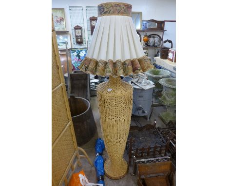 A wicker standard lamp