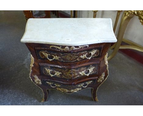 A reproduction French Louis XV style marble topped commode