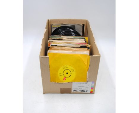 A quantity of 7" vinyl records, including The Rolling Stones, Hawkwind, The Special AKA, The Selecter, The Police, The Jam, C