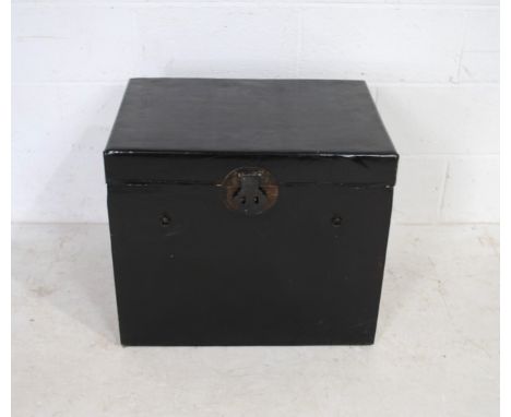 A vintage Oriental black lacquered trunk - length 63cm, depth 45cm, height 54cm