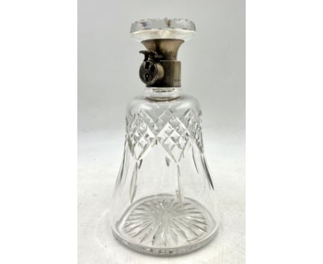 A cut-glass decanter with lockable silver collar (no key), inscription to rear of collar reads "U V R Hogg Cup 1932 2nd Prize