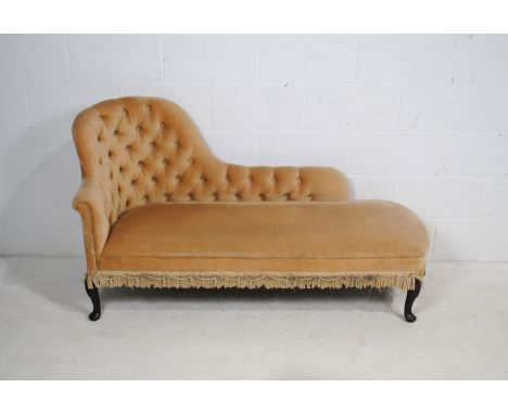 A Victorian style chaise longue, with button-back detailing, raised on carved cabriole legs - length 142cm