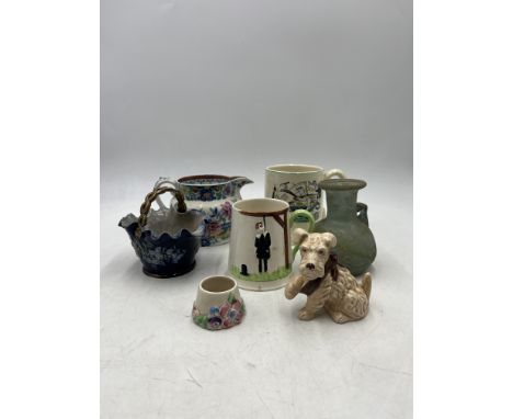 An assortment of ceramics including a Carlton ware 'Hanging' tankard with embossed hanging pilgrim to front and verse to back