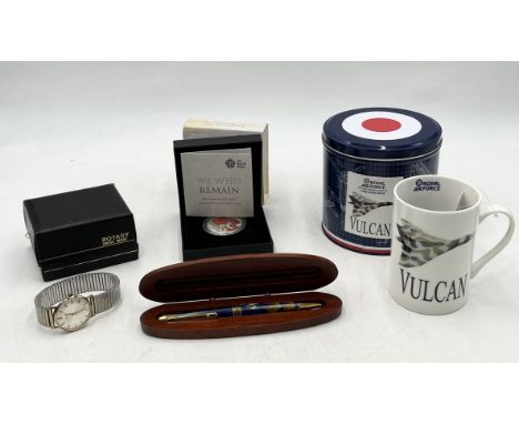 A collection of items including the Royal Mint We Who Remain Remembrance Day 2015 Alderney £5 silver proof coin, Rotary Watch