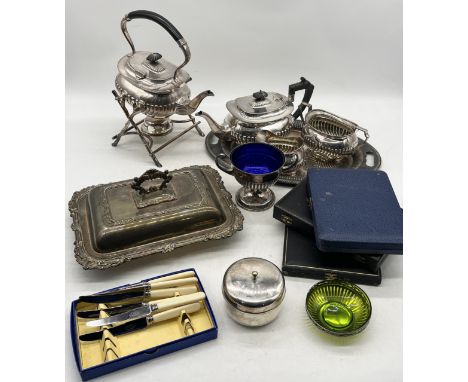 A collection of various silver plated items including tea service, cutlery, serving dish etc.