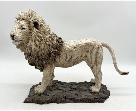 A resin sculpture of a lion with indistinct signature and numbered 207/250