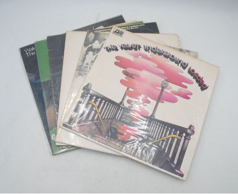 A collection of six 12" vinyl record albums by The Velvet Underground and Lou Reed, including 'Loaded', 'White Light/White He