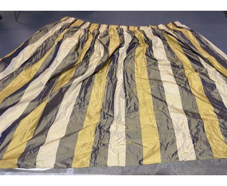 A pair of silk lined curtains each measuring 226cm x 186cm width (at top)