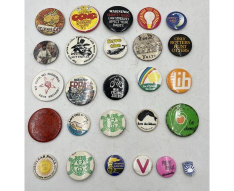 A collection of vintage button/pin badges mainly from the 1970's on the theme of political activism and alternative music inc