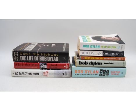 A collection of eight books relating to Bob Dylan