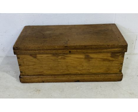 An antique pine trunk with lift out tray. 88cm x 44cm, height 37cm