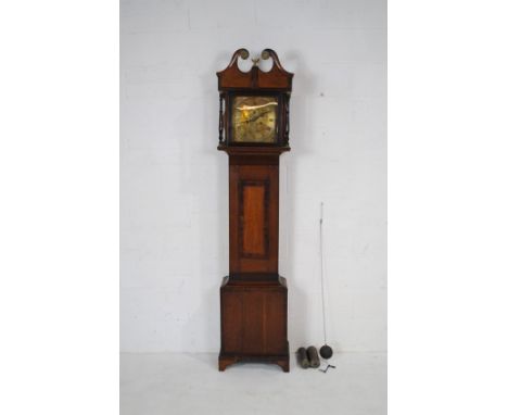 A Georgian oak longcase clock, with ornate brass dial and gilt eagle finial, with keys - height 209cm