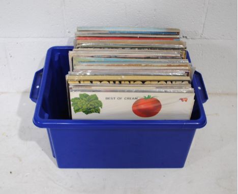 A collection of 12" vinyl records consisting of mostly classic rock, including Cream, The Troggs, The Rolling Stones, Bob Dyl