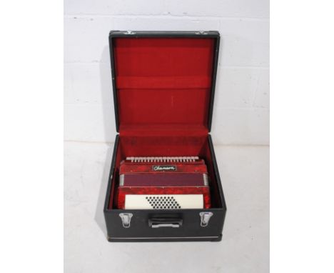 A Chanson accordion, with case