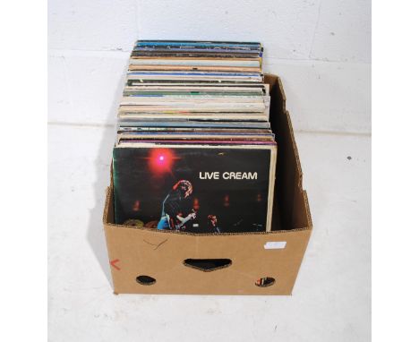 A quantity of various 12" vinyl records, including Cream, Leonard Cohen, Joe Cocker, Bob Dylan, Donovan, Ry Cooder, The Beach