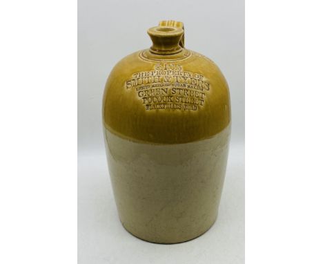 A large vintage cider flagon, marked Smith & Tyers - overall height 50cm
