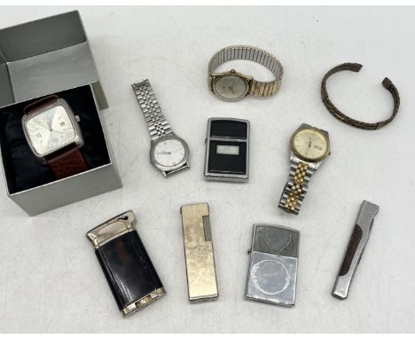 A collection of vintage watches, lighters etc.