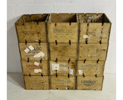 A set of twelve vintage Unibloc wooden crates