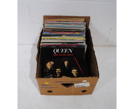 A quantity of various 12" vinyl records, including Dire Straits, Queen, Rod Stewart, Tina Turner, Meat Loaf, Culture Club, Th