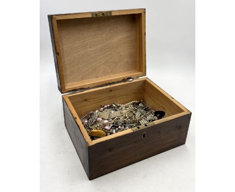 A collection of vintage costume jewellery within decorated wooden box 