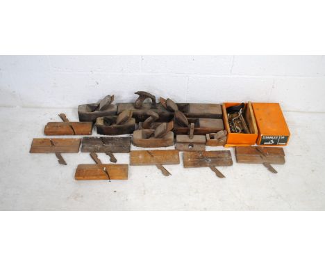 A quantity of vintage wood planes, including a boxed Stanley #50 