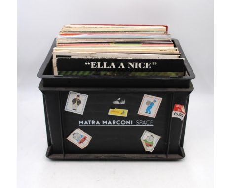 A collection of jazz 12" vinyl records, including Ella Fitzgerald, Fats Waller, Django Reinhardt, George Shearing, Stephane G