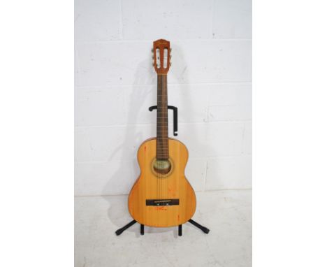 A Fender Acoustics ESC80 3/4 size classical guitar, with Stagg stand