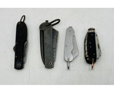 A collection of four vintage army pocket knives