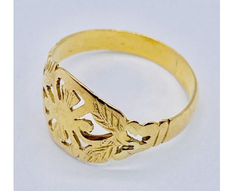 An unmarked 18ct gold (tested) signet ring with pierced decoration, weight 3g, size P