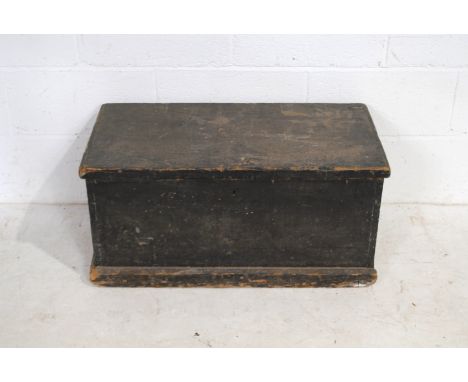 An antique black painted pine trunk - length 79cm, depth 44.5cm, height 38cm