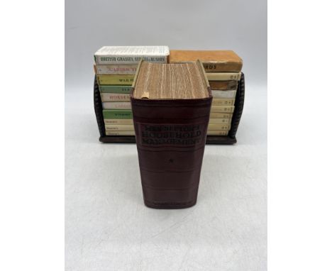 A vintage Mrs Beeton's household management book along with a selection of Observer books and a folding, sliding bookshelf