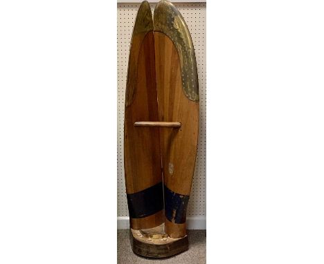 EARLY 20TH CENTURY LAMINATED WOODEN PROPELLOR - with brass tips, cut in half and fashioned as stick stand, the centre forming