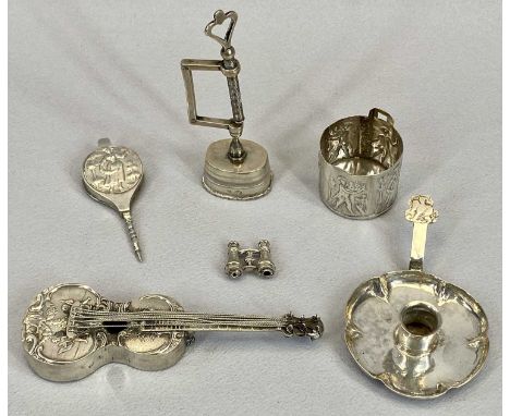 CONTINENTAL SILVER/WHITE METAL NOVELTY ITEMS (6) - a model of a guitar embossed with figures and other adornments, 12.25cms L