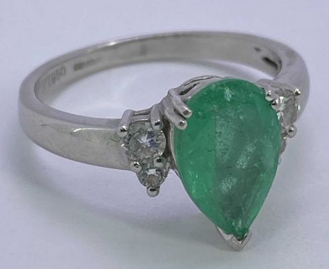 PLATINUM PEAR CUT EMERALD &amp; DIAMOND RING - approx 1.5ct emerald, 12 x 8mm, the tip shoe mounted, flanked by four round cu