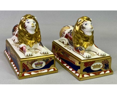 ROYAL WORCESTER NELSON COLLECTION - a pair of Trafalgar lions No 423/750, each 11.5cms H, 15cms W, 8cms D, boxed with certifi