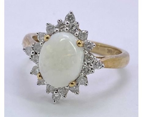 9CT GOLD STAR CLUSTER OPAL &amp; DIAMOND DRESS RING - 10 x 8mm claw set oval opal, surrounded by 20 small diamonds over a bas